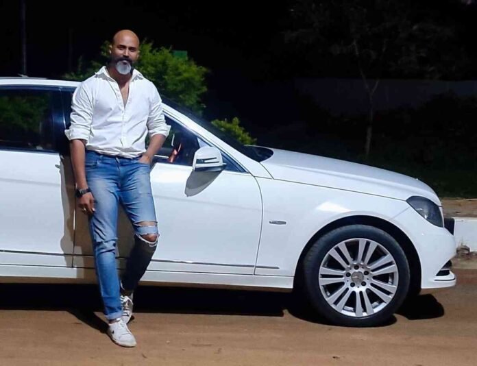 Roan Nair, Showbizz Cars, automotive luxury, filmmaking, car rental, luxury car rentals, film production, corporate events, exotic cars, custom cars, 2D automotive rendering, 3D automotive rendering, automotive pre-design, vendor-based model, automotive consultant, film shoots, automotive content, automotive investment, automotive startups, automotive consulting, global automotive community, luxury car industry, Bangalore, India, automotive innovation, cinematic vehicles, car branding, Roan Nair entrepreneur, Showbizz Cars founder